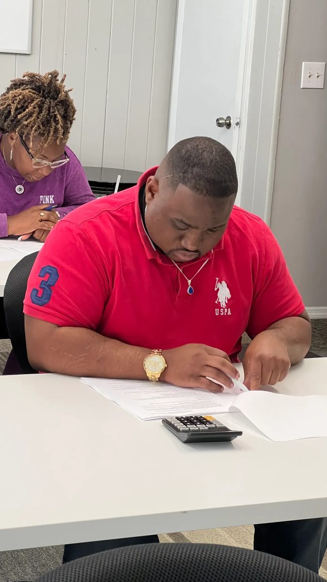 Students working through practice questions in class